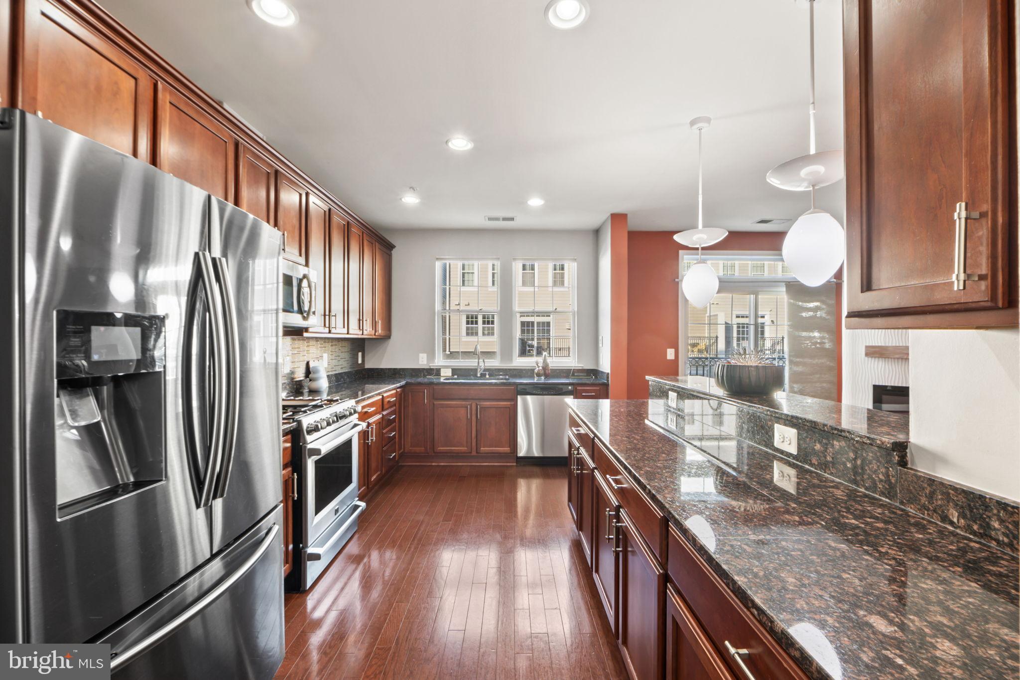 7676 Maple Lawn Boulevard, Unit 2 Fulton, MD 20759 - Photo 20 of 38 Sleek kitchen with modern finishes and light.