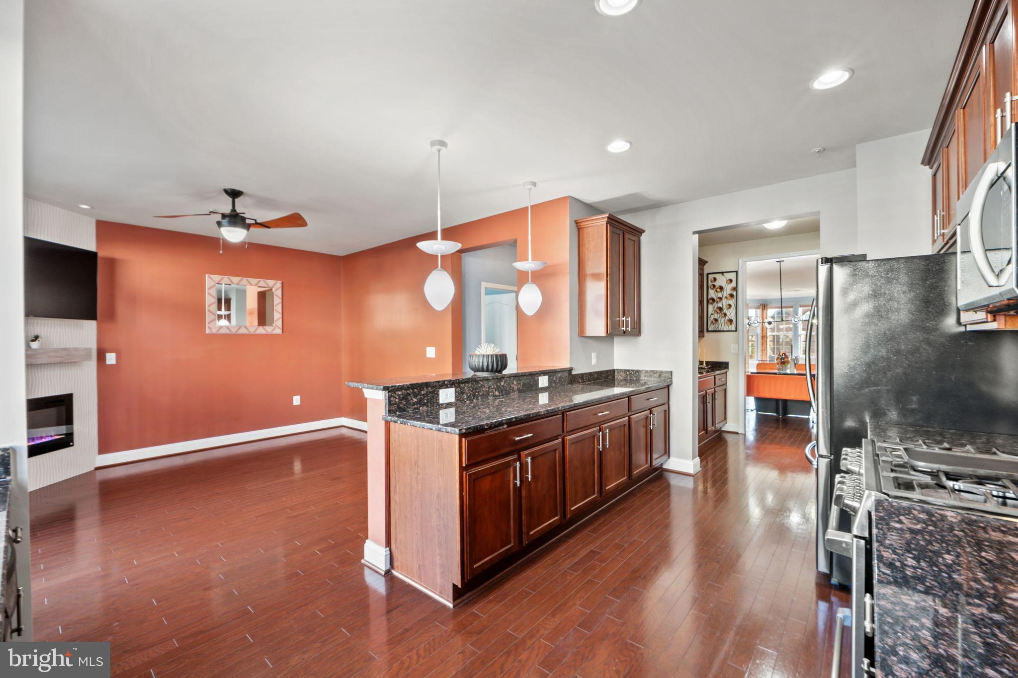 7676 Maple Lawn Boulevard, Unit 2 Fulton, MD 20759 - Photo 22 of 38 Modern kitchen with warm accents and style.
