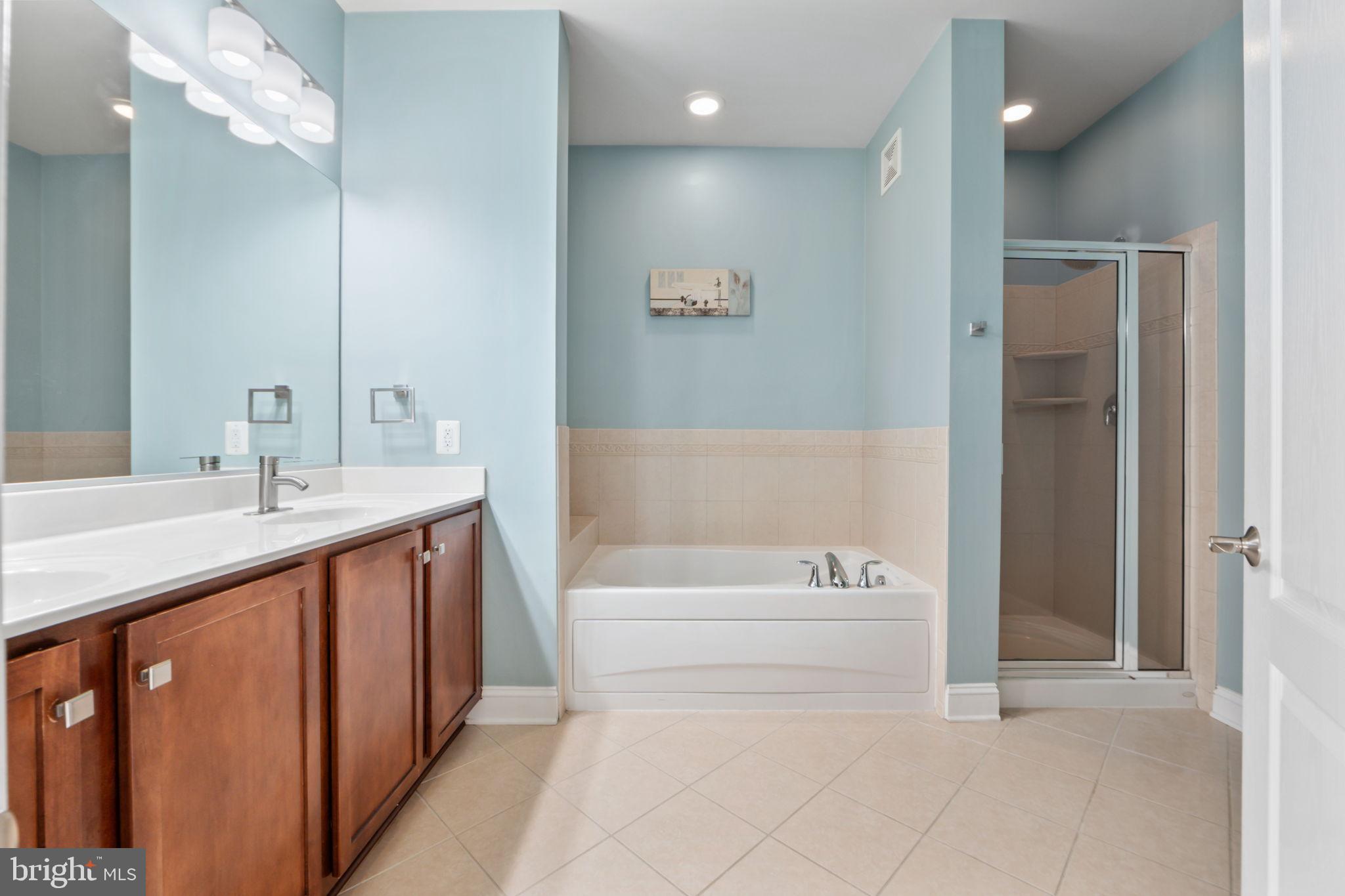 7676 Maple Lawn Boulevard, Unit 2 Fulton, MD 20759 - Photo 29 of 38 Serene bathroom retreat with modern finishes.