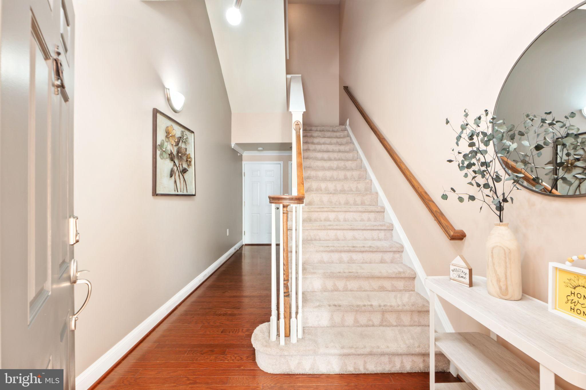 7676 Maple Lawn Boulevard, Unit 2 Fulton, MD 20759 - Photo 3 of 38 Inviting entryway with elegant staircase.