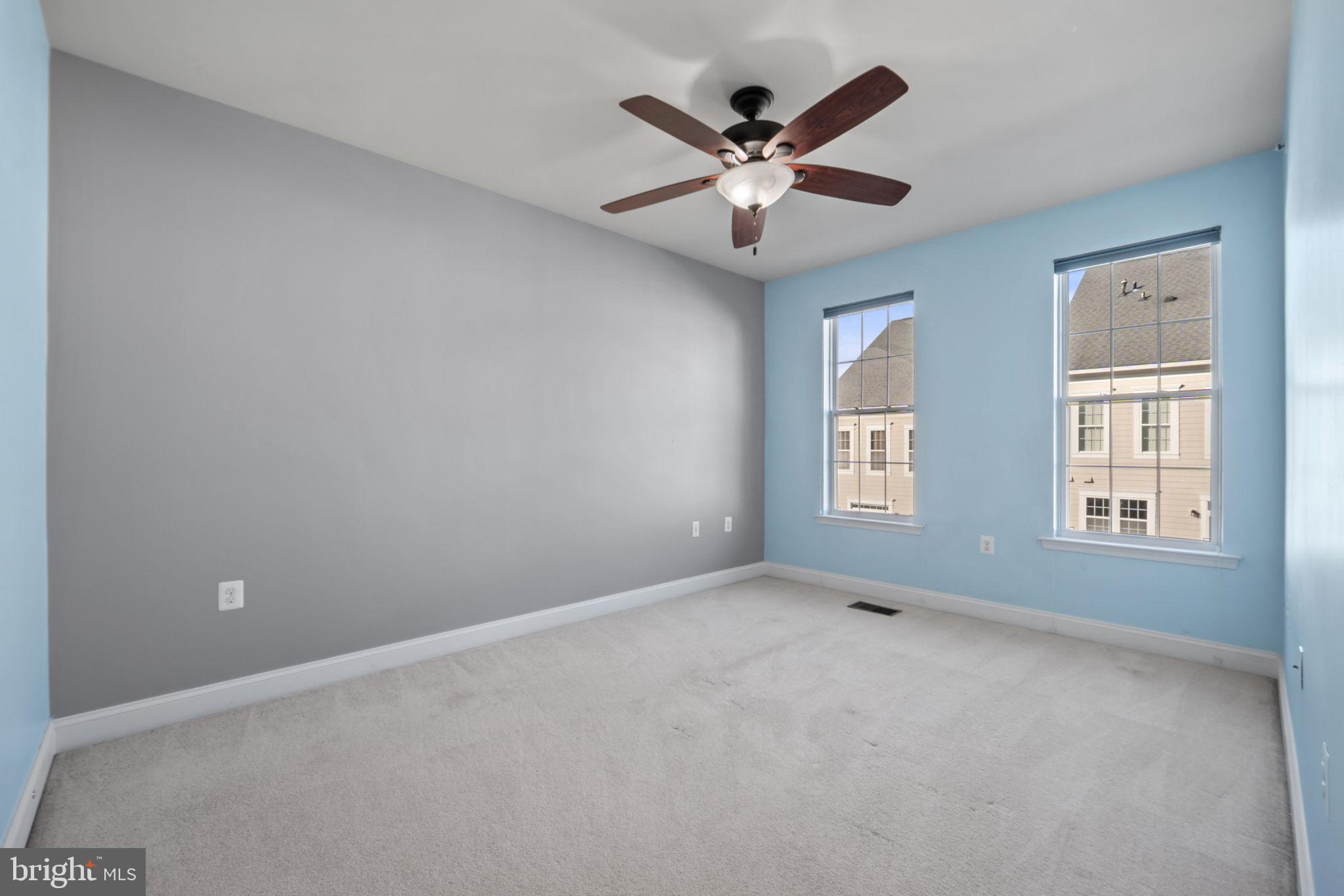 7676 Maple Lawn Boulevard, Unit 2 Fulton, MD 20759 - Photo 32 of 38 Bright and airy bedroom with serene colors.