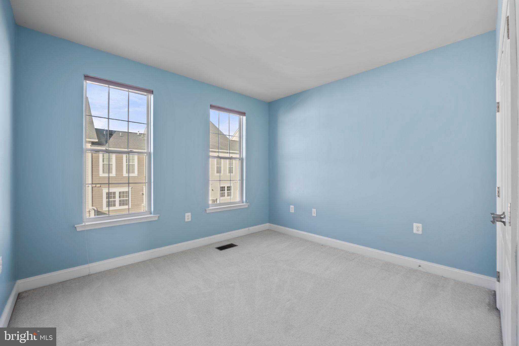 7676 Maple Lawn Boulevard, Unit 2 Fulton, MD 20759 - Photo 35 of 38 Bright and airy room with serene blue walls.
