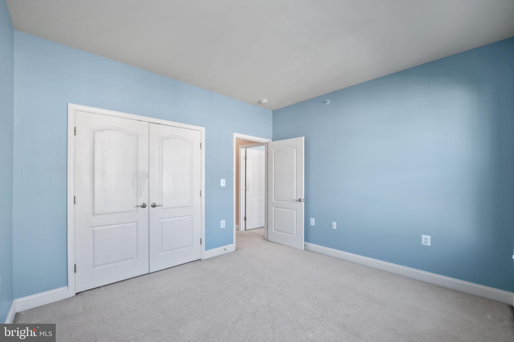 7676 Maple Lawn Boulevard, Unit 2 Fulton, MD 20759 - Photo 36 of 38 Serene blue walls invite endless possibilities.