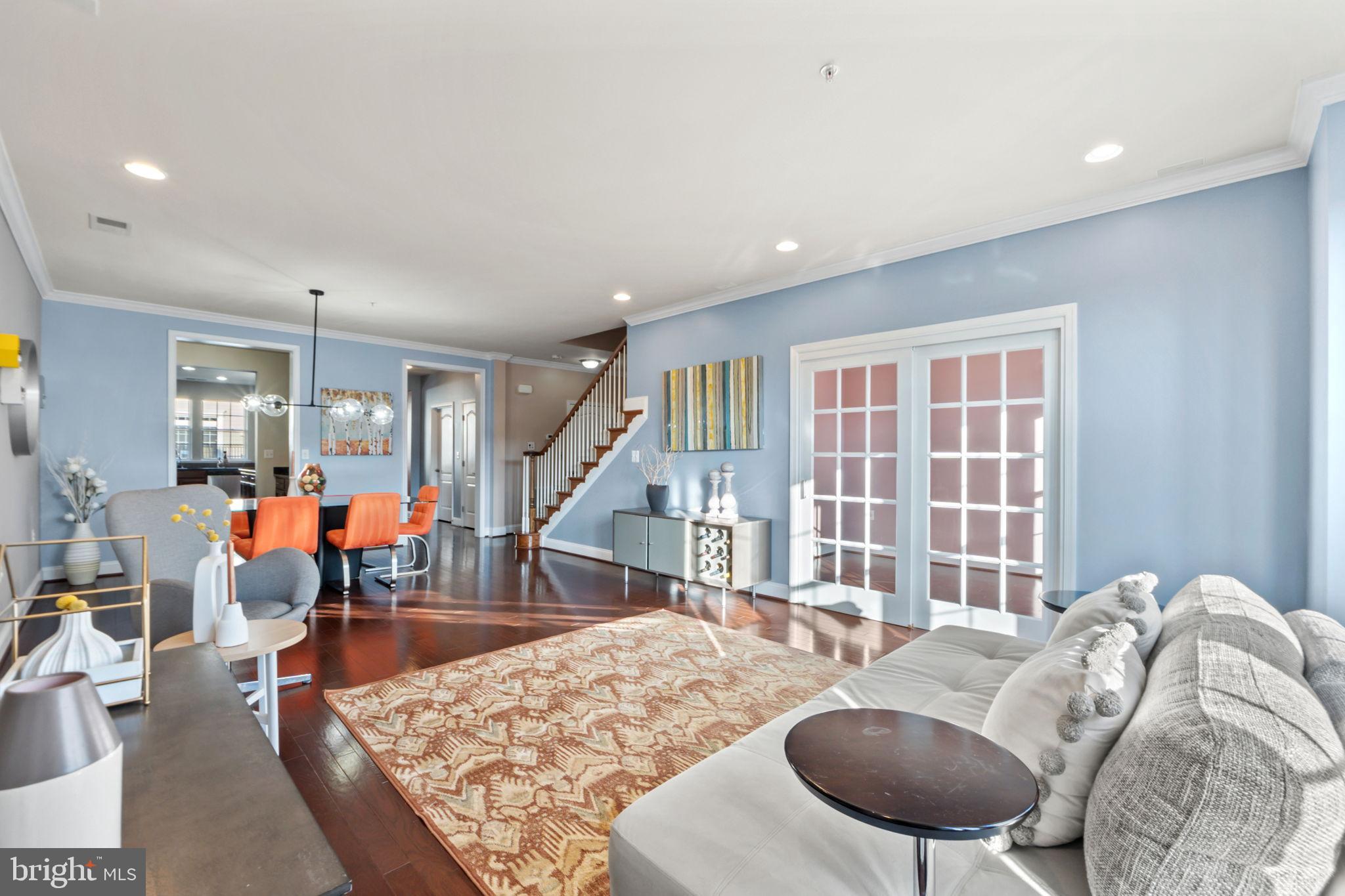 7676 Maple Lawn Boulevard, Unit 2 Fulton, MD 20759 - Photo 9 of 38 Bright and inviting open-concept living space.