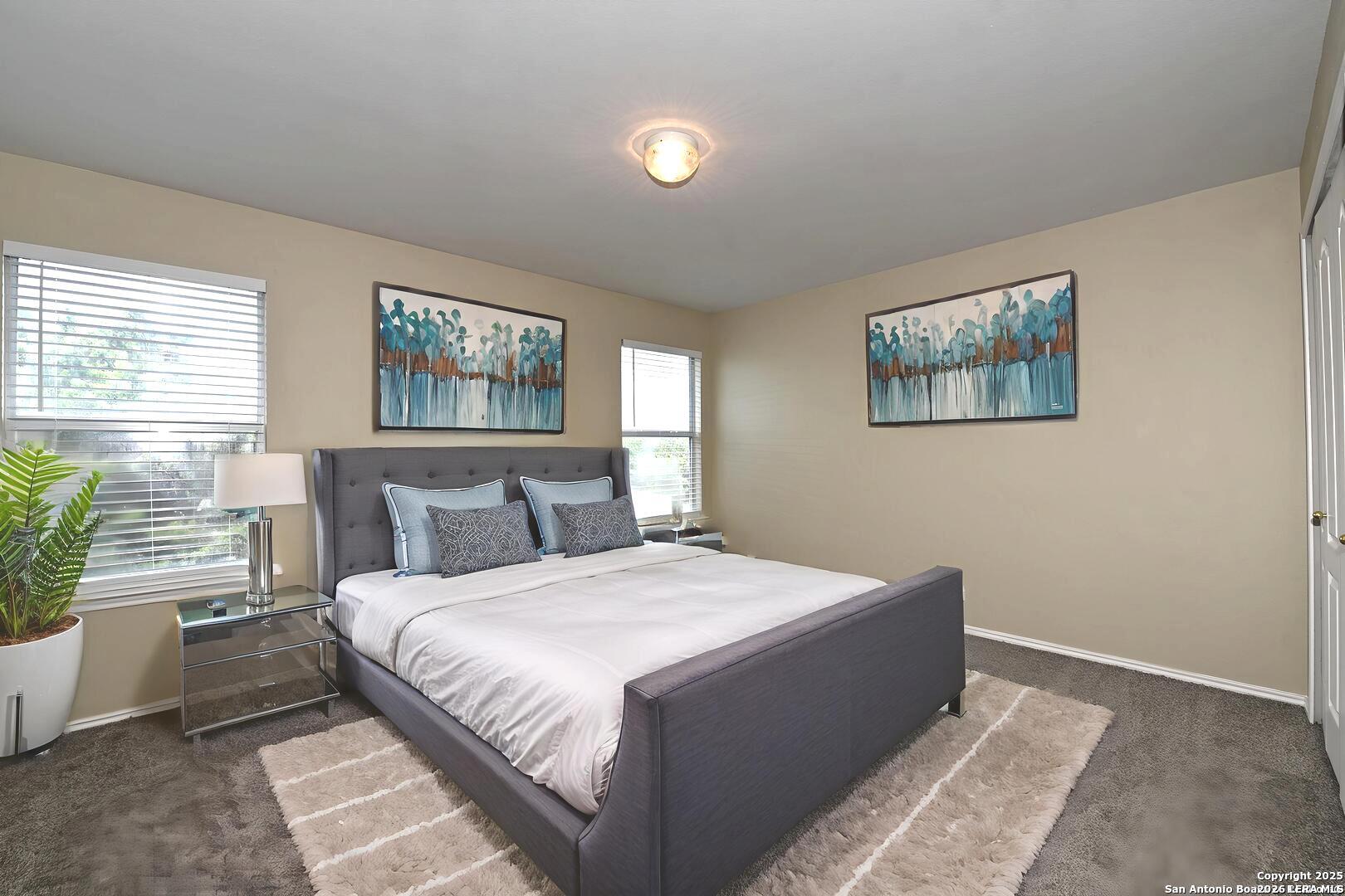 25303 Mesa Ranch San Antonio, TX 78258 - Photo 13 of 54 a bedroom with bed and window
