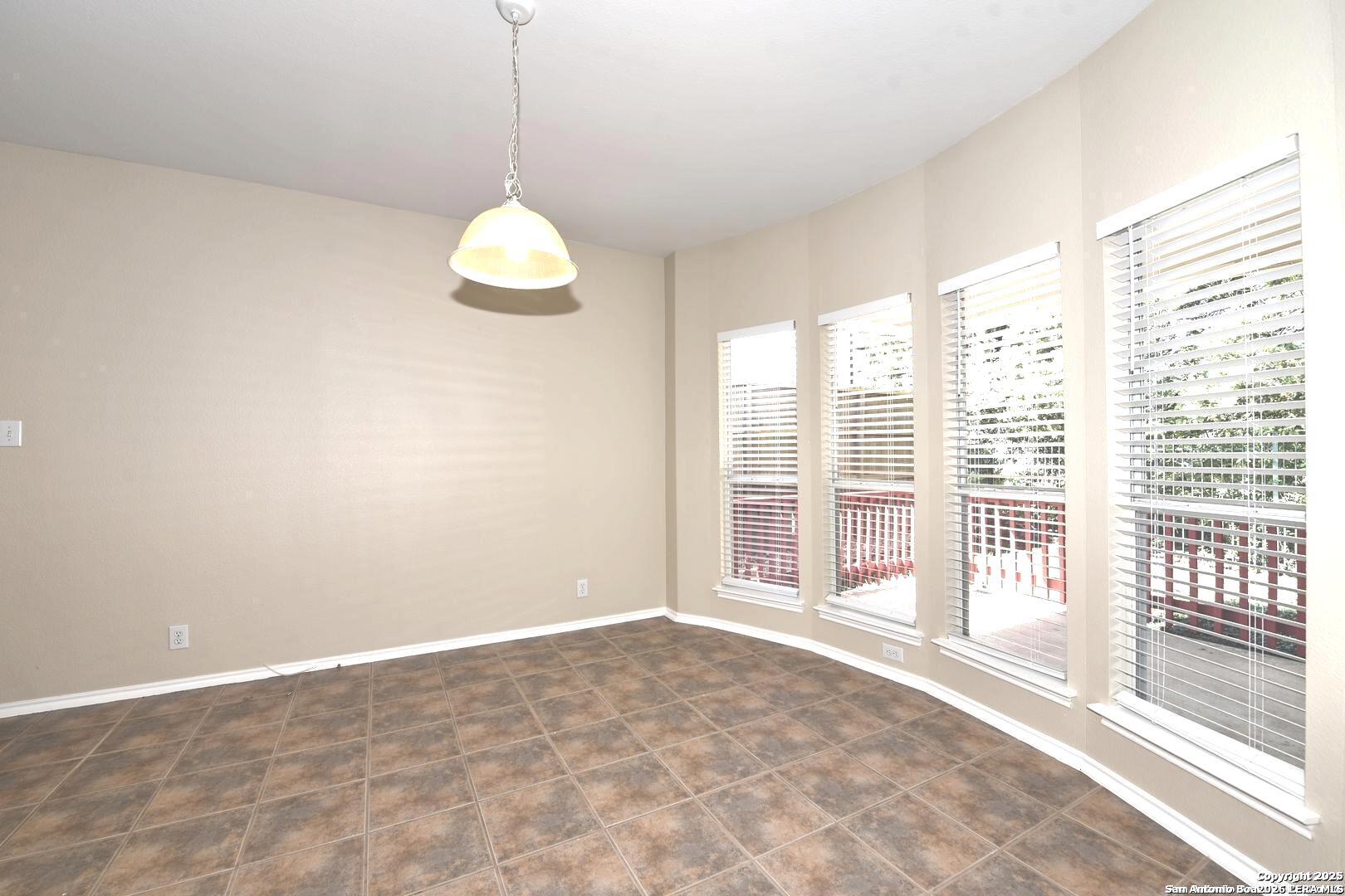 25303 Mesa Ranch San Antonio, TX 78258 - Photo 28 of 54 a view of an empty room with a window