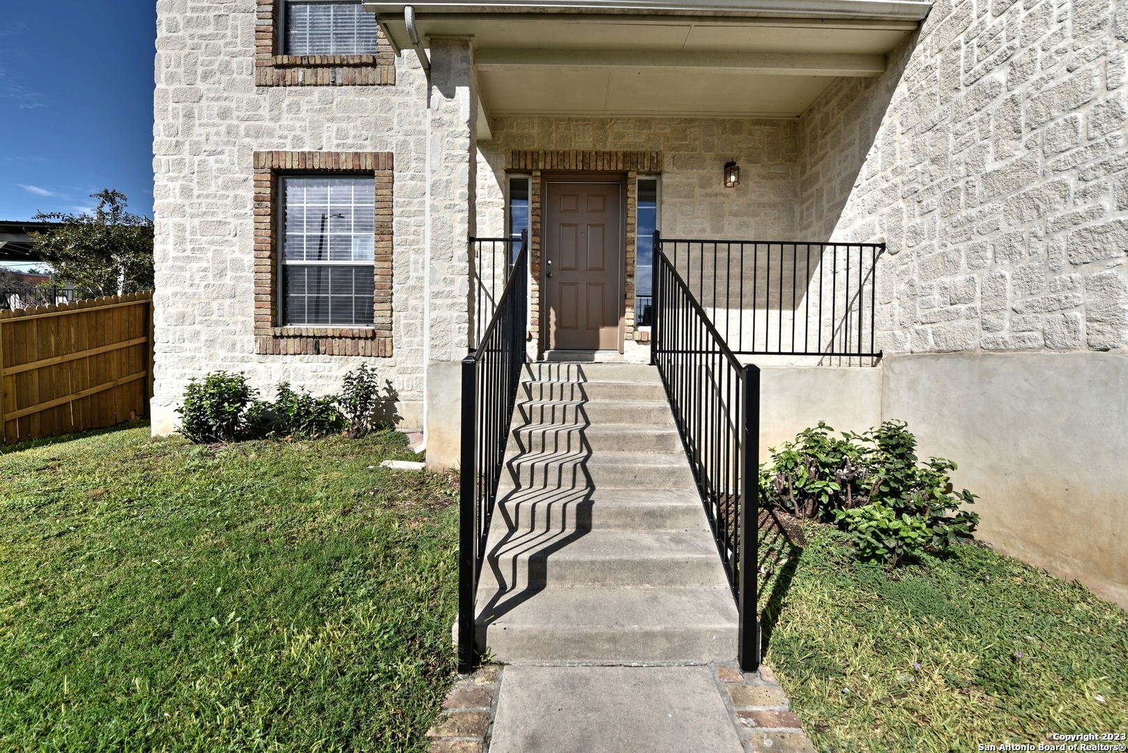 25303 Mesa Ranch San Antonio, TX 78258 - Photo 3 of 54 a view of a entryway with flower plants