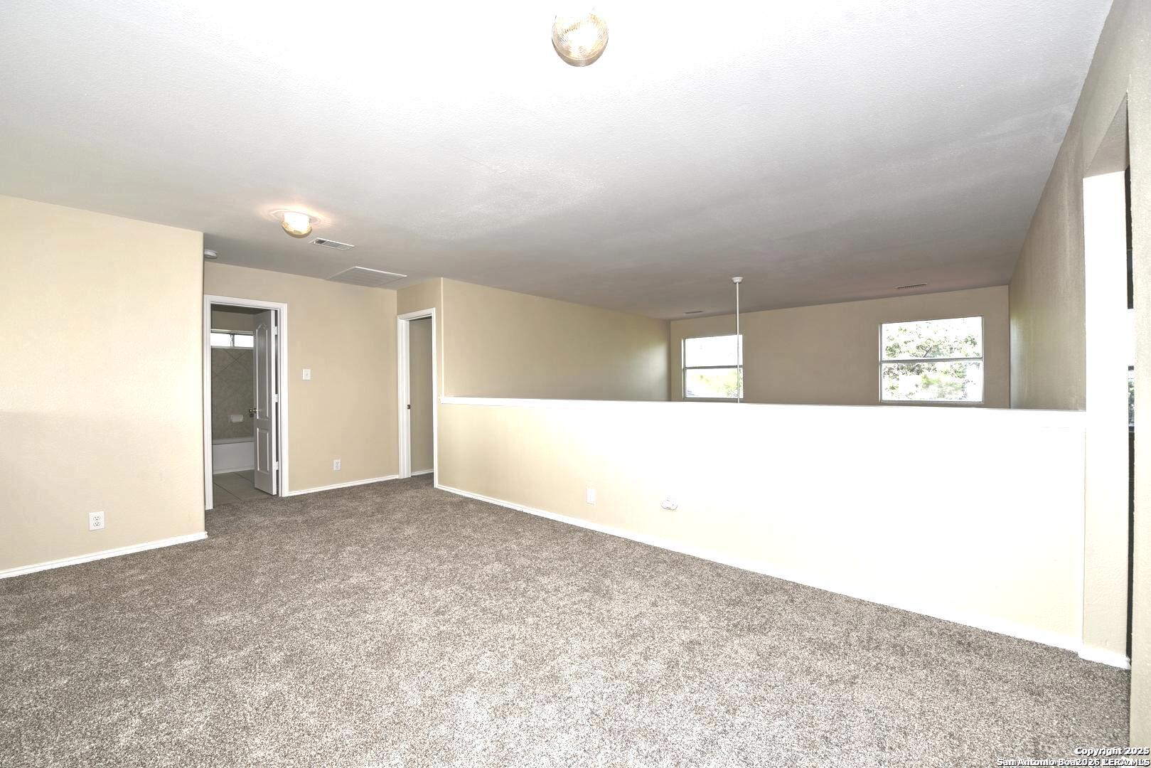 25303 Mesa Ranch San Antonio, TX 78258 - Photo 39 of 54 a view of an empty room