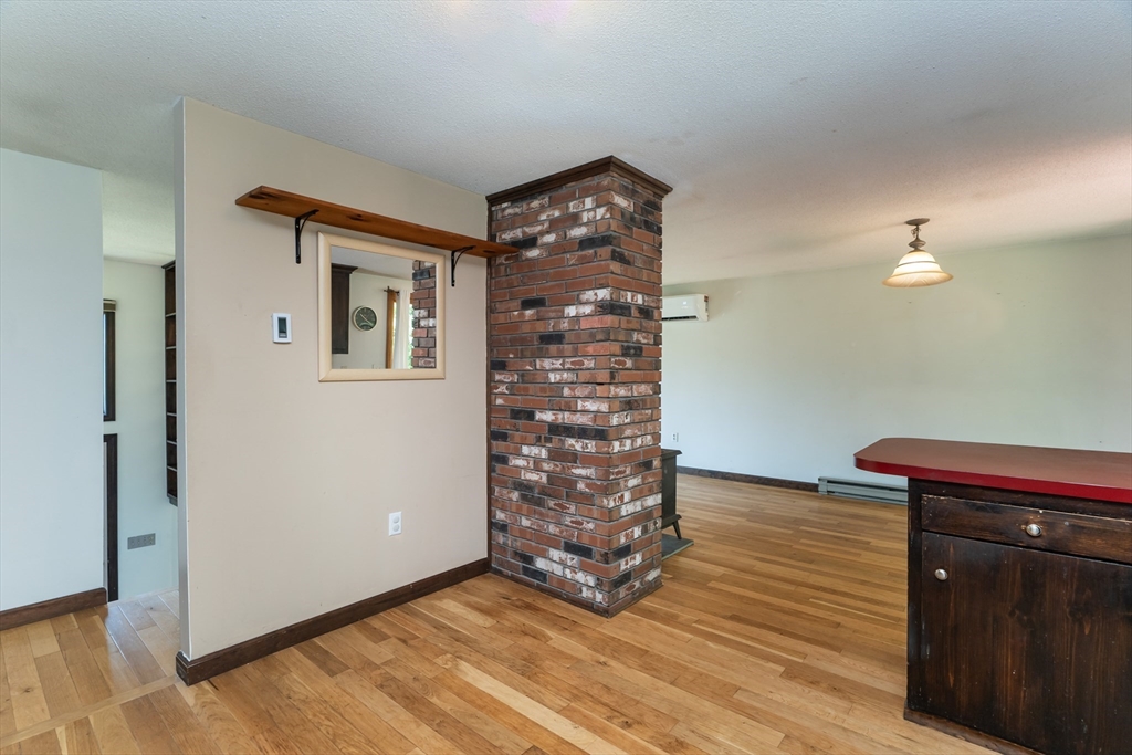 17 Pomeroy Court Amherst, MA 01002 - Photo 18 of 41 a view of a livingroom with wooden floor