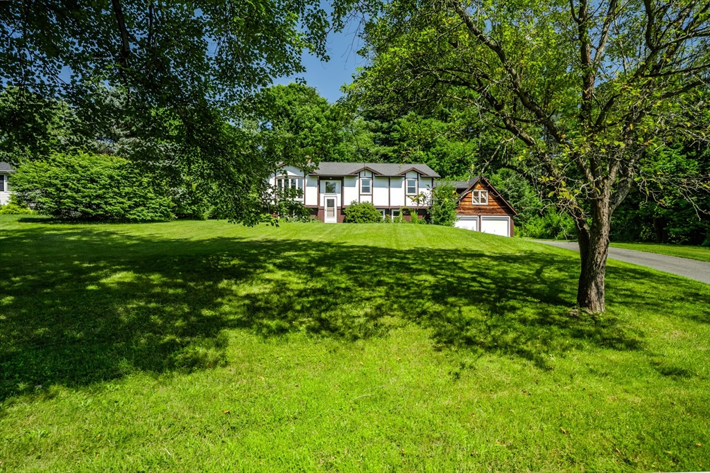 17 Pomeroy Court Amherst, MA 01002 - Photo 2 of 41 a front view of a house with a yard