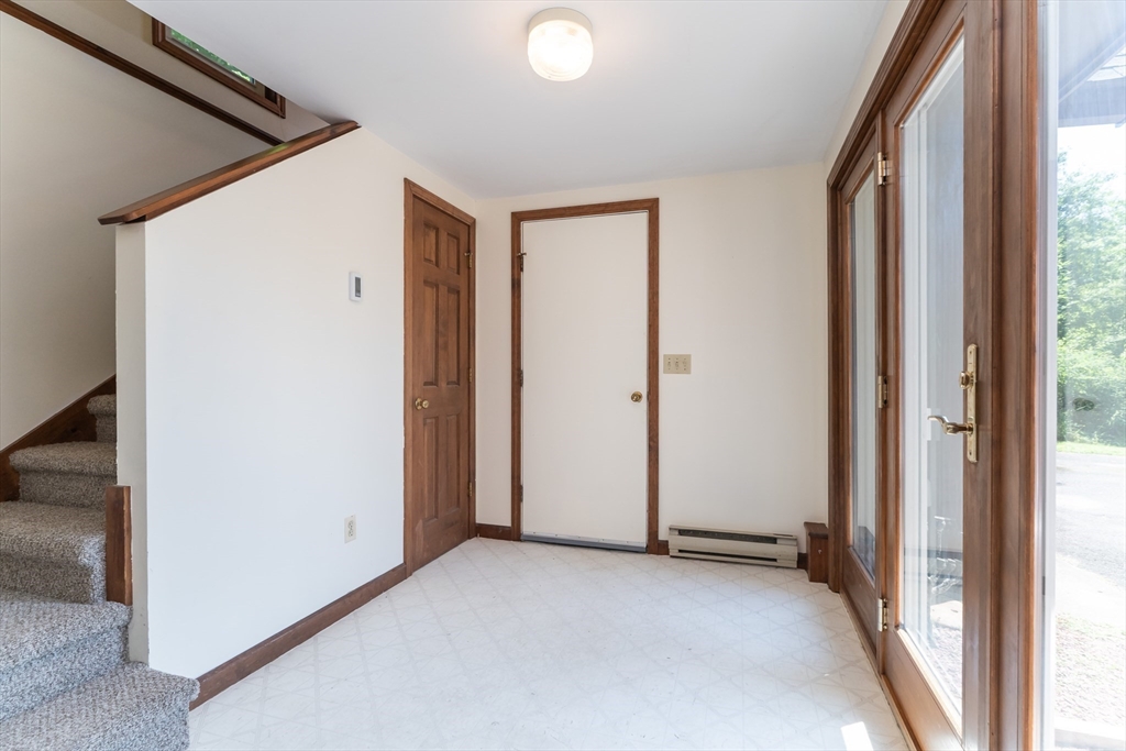 17 Pomeroy Court Amherst, MA 01002 - Photo 27 of 41 a view of a livingroom with wooden floor and windows