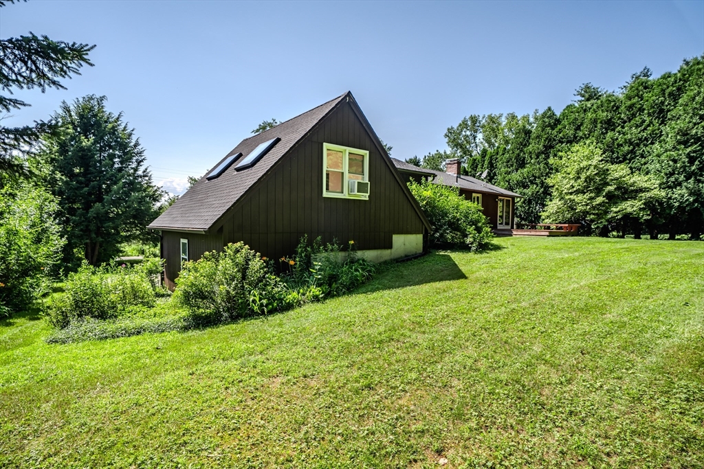17 Pomeroy Court Amherst, MA 01002 - Photo 35 of 41 a front view of a house with a yard