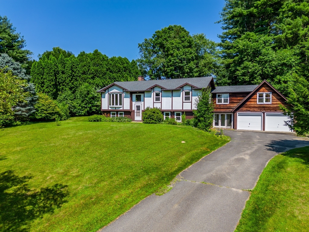 17 Pomeroy Court Amherst, MA 01002 - Photo 5 of 41 a front view of a house with yard and green space