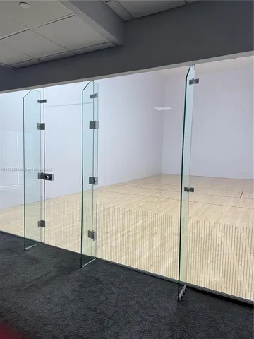 a view of a livingroom with a furniture and chandelier