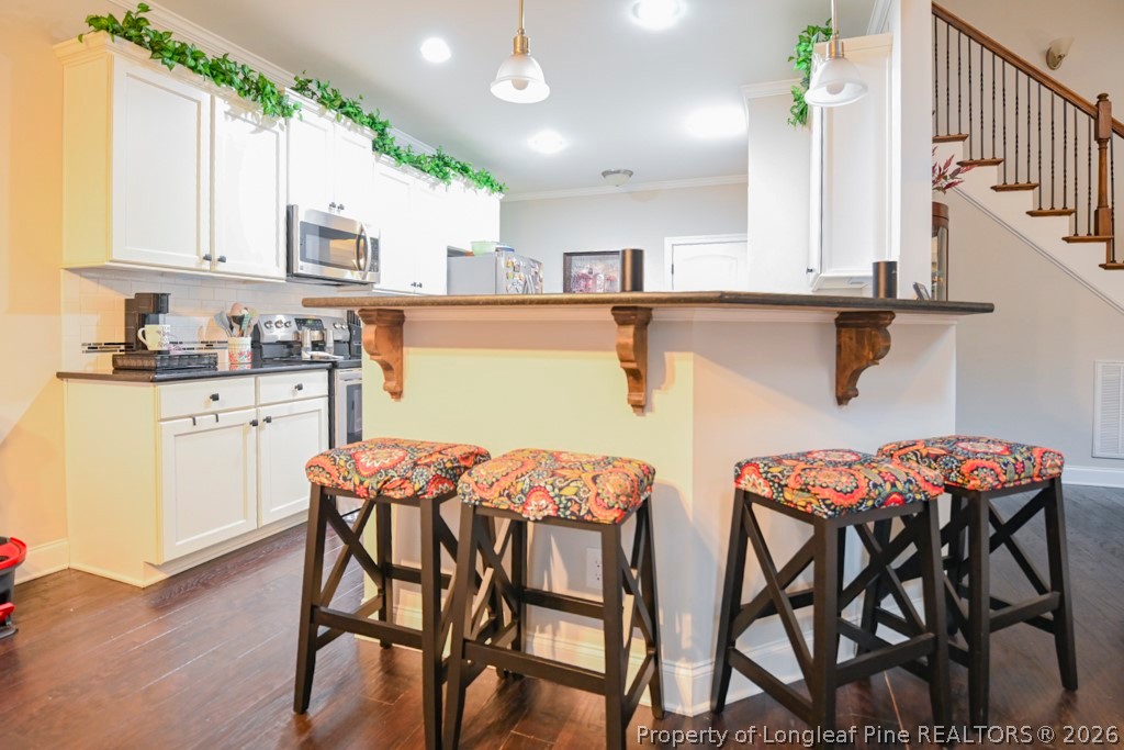 95 Valley Brook Lane Spring Lake, NC 28390 - Photo 11 of 34 a dining room with furniture and window