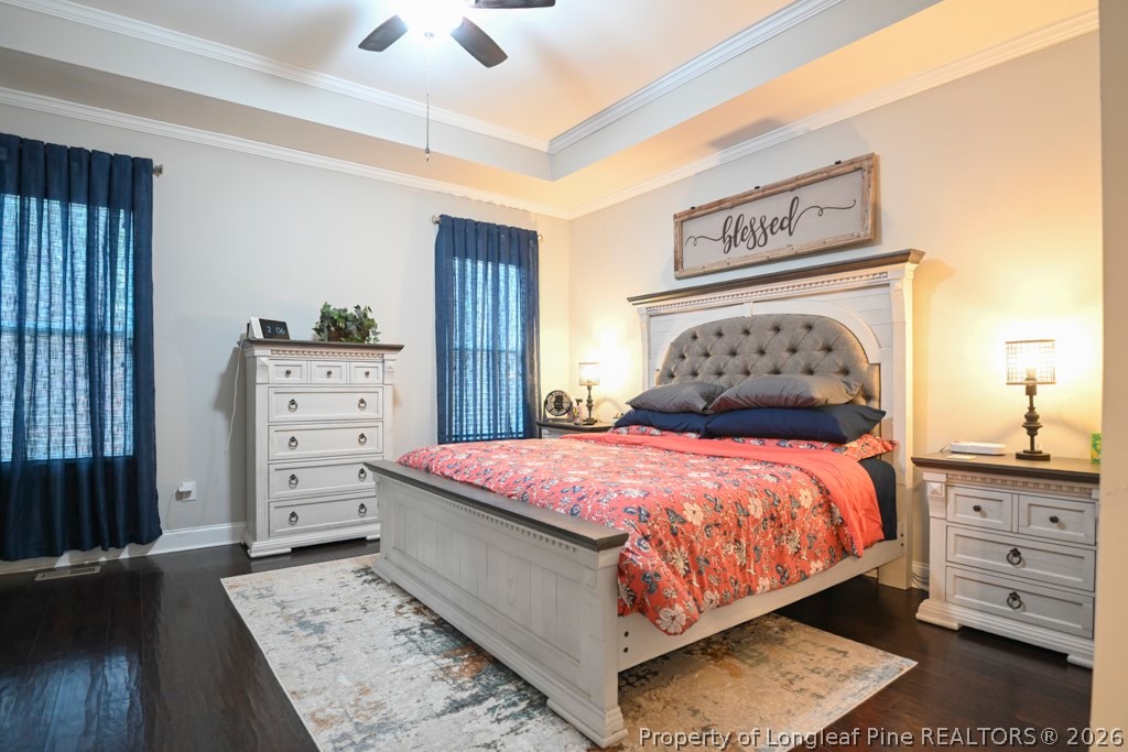 95 Valley Brook Lane Spring Lake, NC 28390 - Photo 15 of 34 a bedroom with a bed and a dresser