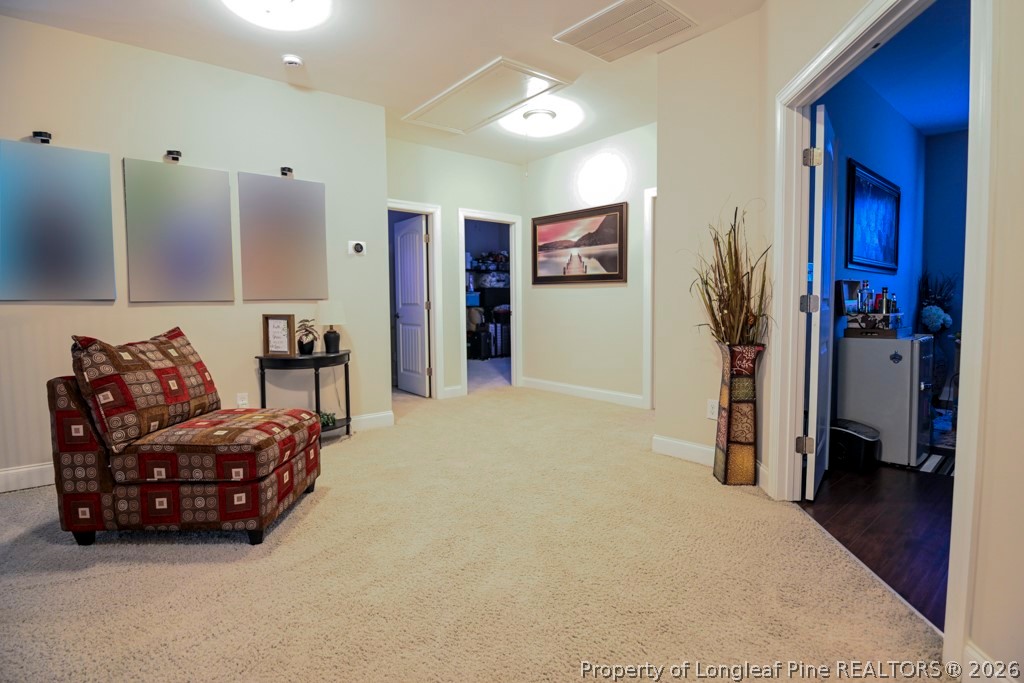 95 Valley Brook Lane Spring Lake, NC 28390 - Photo 21 of 34 a living room with furniture and a flat screen tv