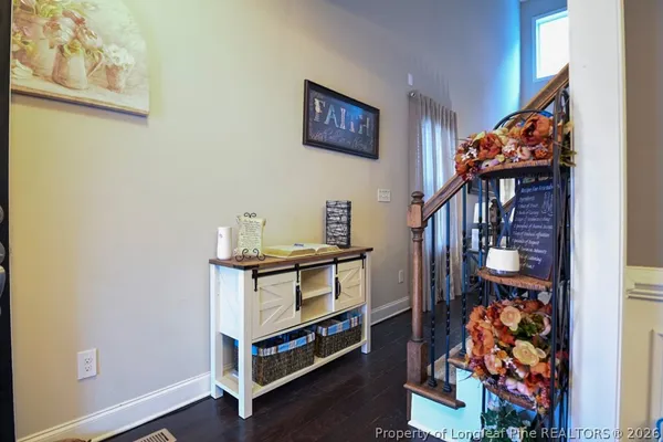 a view of a hallway with workspace