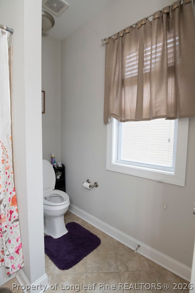 95 Valley Brook Lane Spring Lake, NC 28390 - Photo 32 of 34 a bathroom with a sink and a toilet