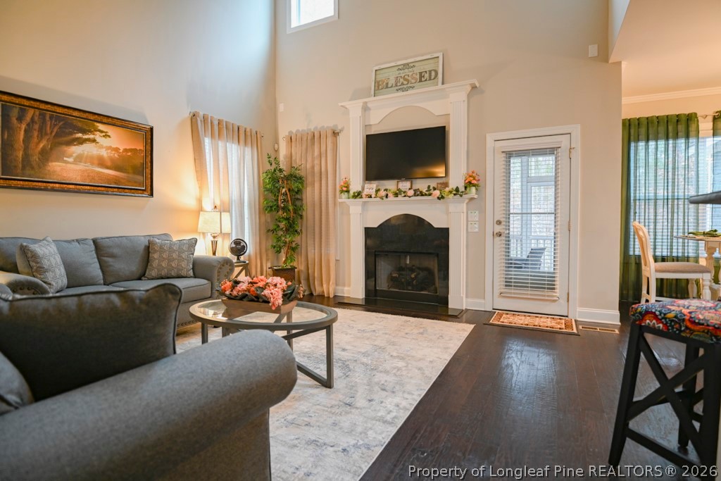 95 Valley Brook Lane Spring Lake, NC 28390 - Photo 6 of 34 a living room with furniture and a fireplace