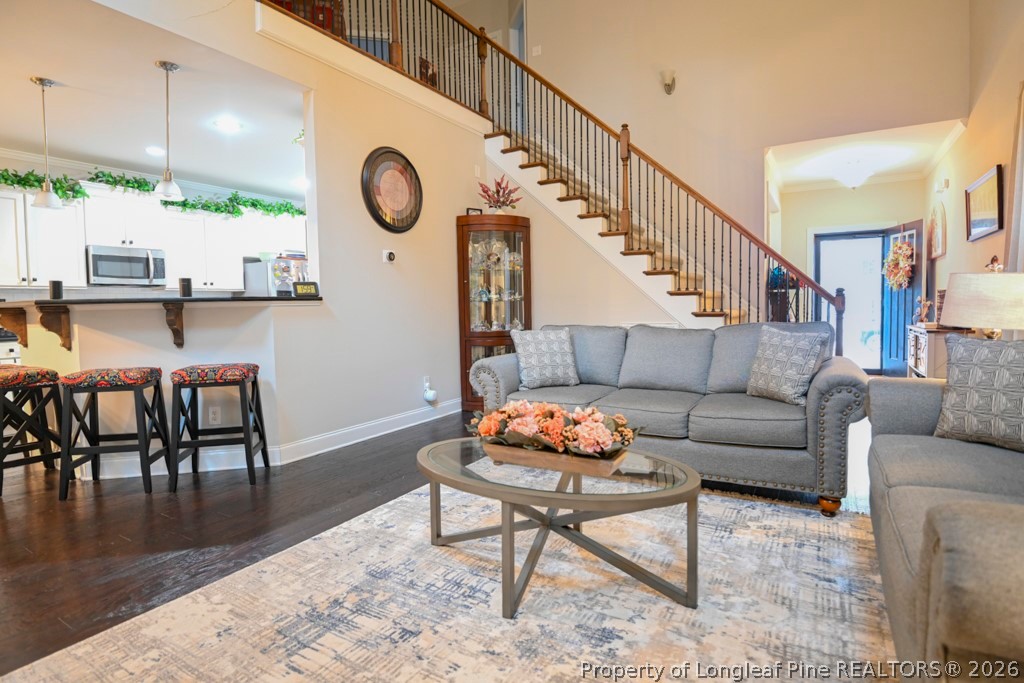 95 Valley Brook Lane Spring Lake, NC 28390 - Photo 8 of 34 a living room with furniture and a wooden floor