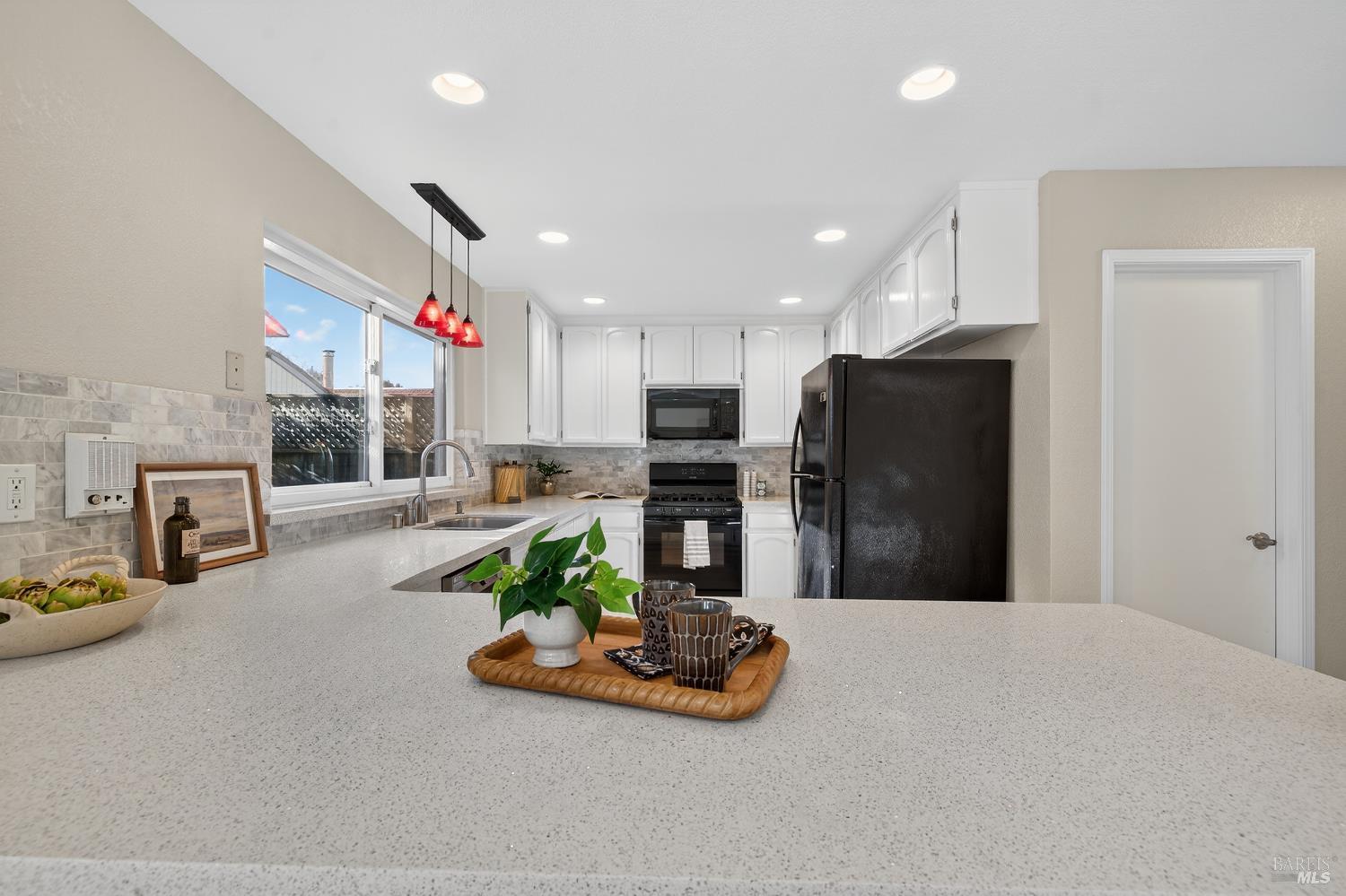 985 Hacienda Circle Rohnert Park, CA 94928 - Photo 12 of 36 a kitchen with refrigerator and microwave
