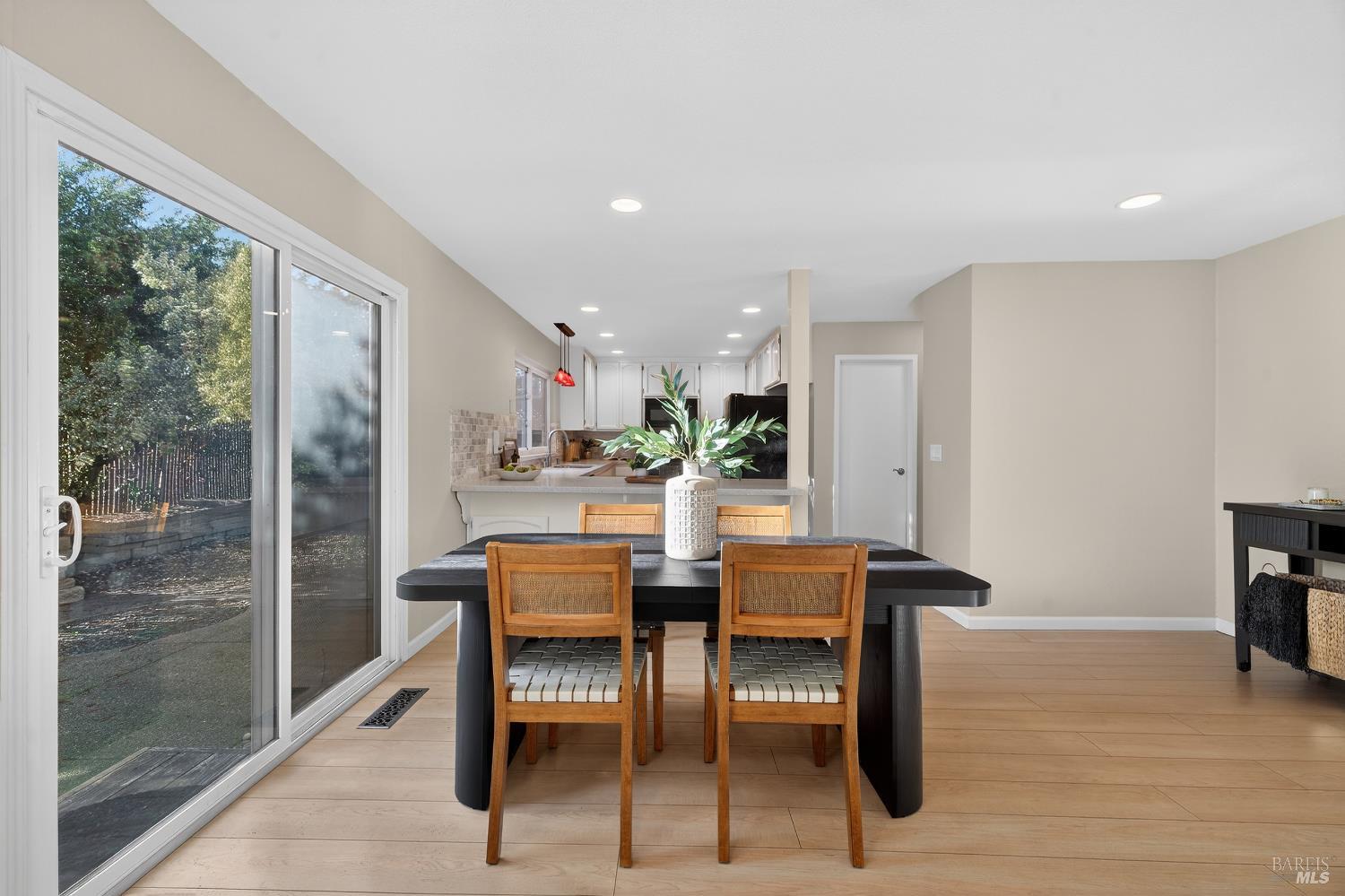 985 Hacienda Circle Rohnert Park, CA 94928 - Photo 15 of 36 a view of a dining room with furniture window and wooden floor