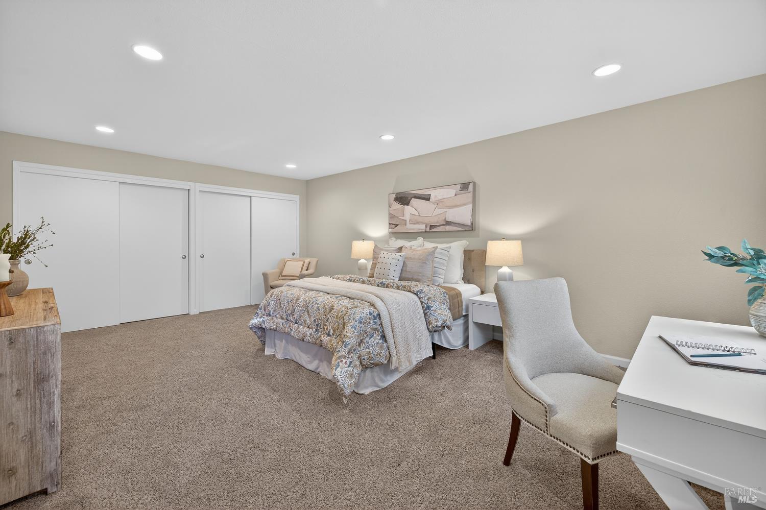 985 Hacienda Circle Rohnert Park, CA 94928 - Photo 21 of 36 a bedroom with a bed and a chair