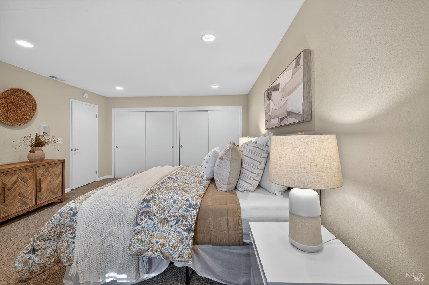 985 Hacienda Circle Rohnert Park, CA 94928 - Photo 28 of 36 a spacious bedroom with a bed and window