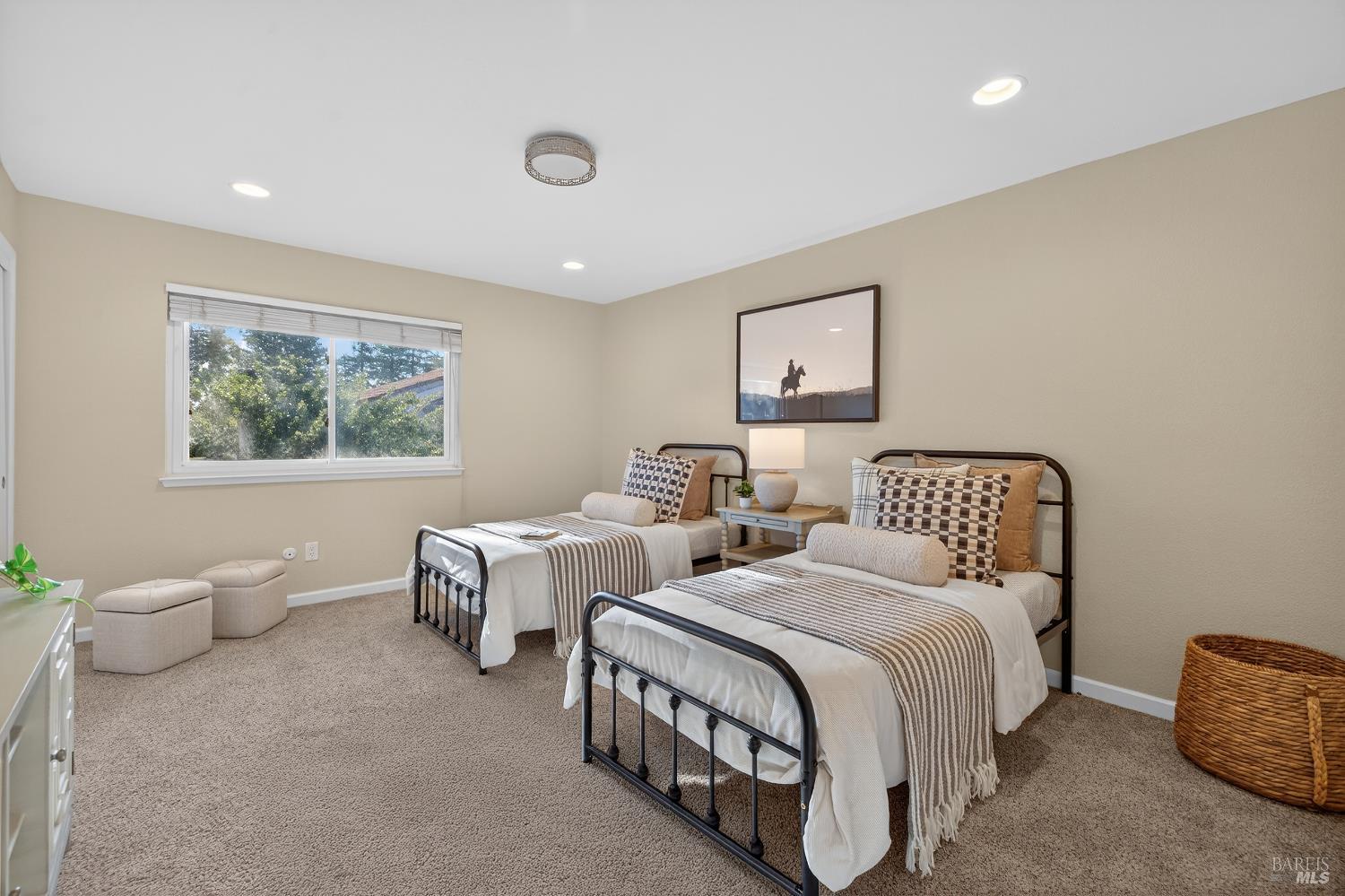985 Hacienda Circle Rohnert Park, CA 94928 - Photo 31 of 36 a spacious bedroom with two beds and a window