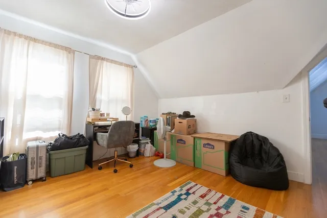 a workspace with furniture and window