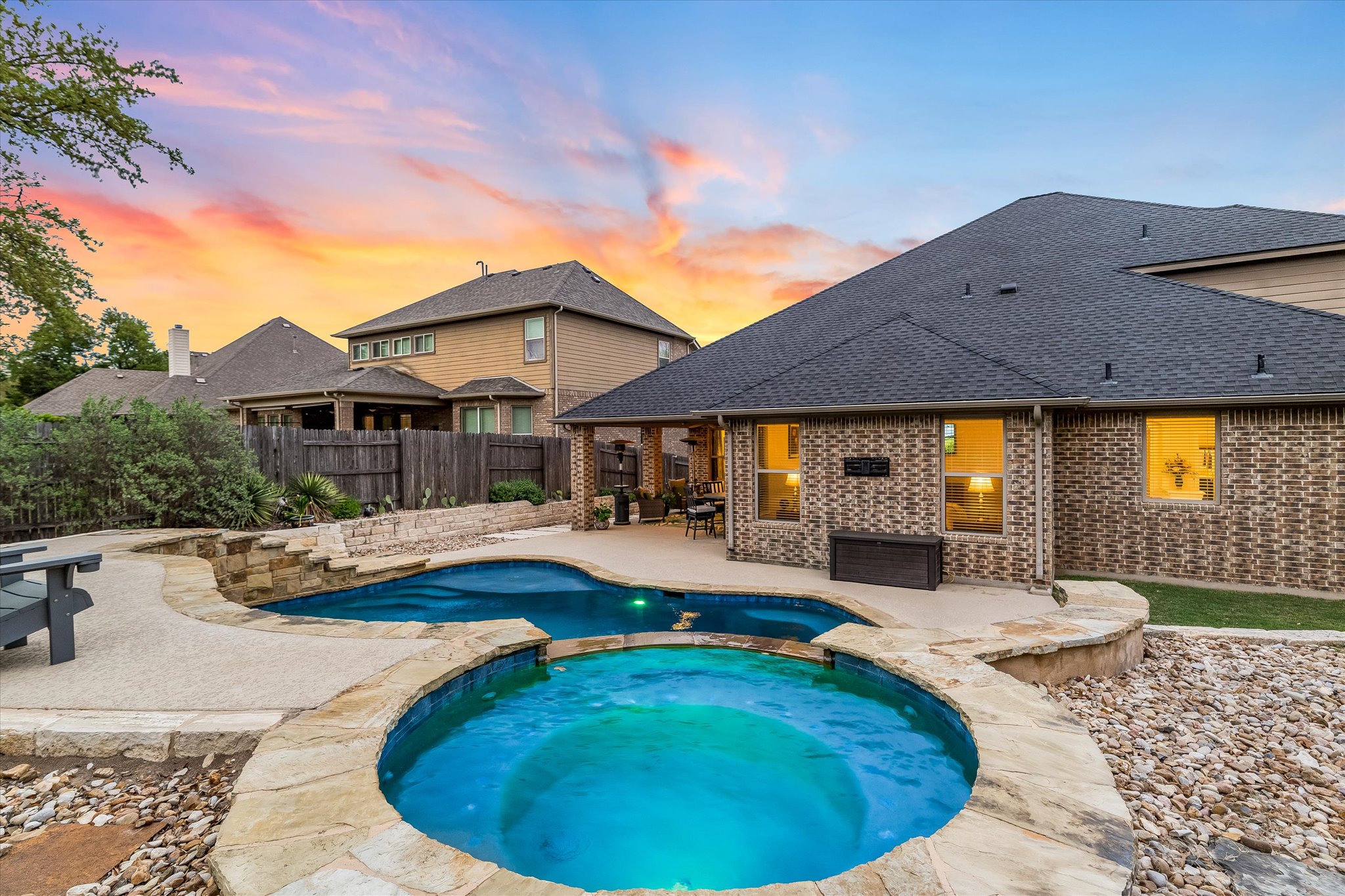 226 Galloway Lane Austin, TX 78737 - Photo 27 of 30 Integrated pool / spa featuring a patio and a fenced backyard