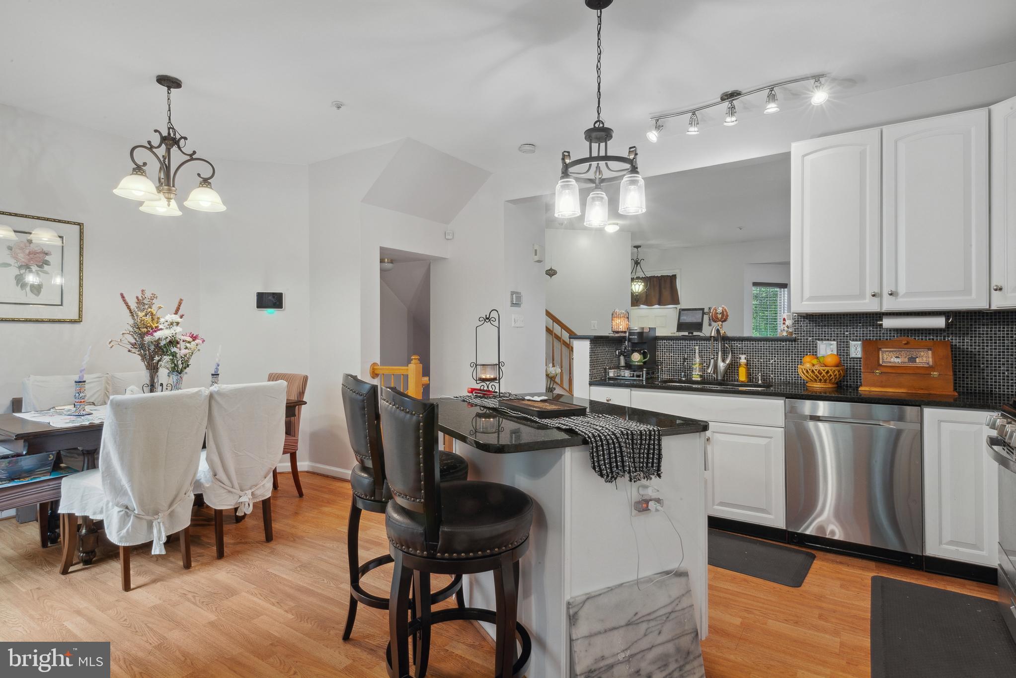 5533 Westcott Circle Frederick, MD 21703 - Photo 13 of 51 Open concept from in-fromal dining to kitchen