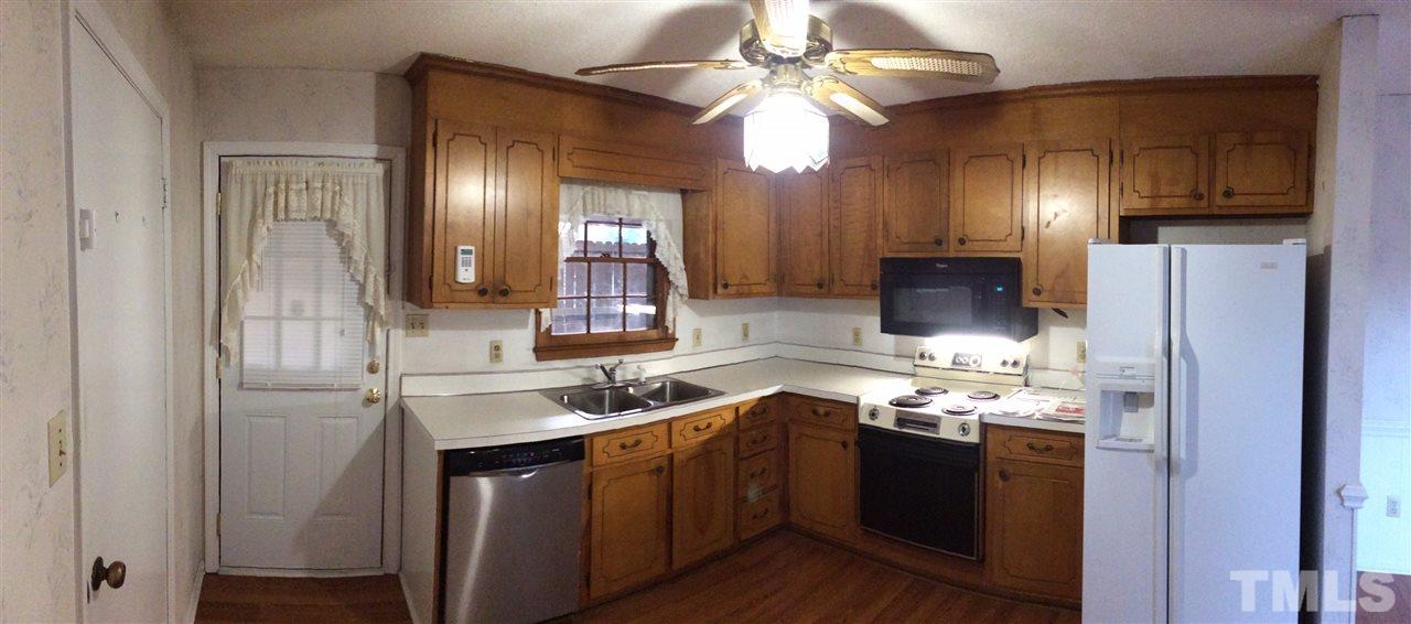 4224 Green Raleigh Nc 27604 Raleigh, NC 27604 - Photo 2 of 7 a kitchen with a sink and refrigerator