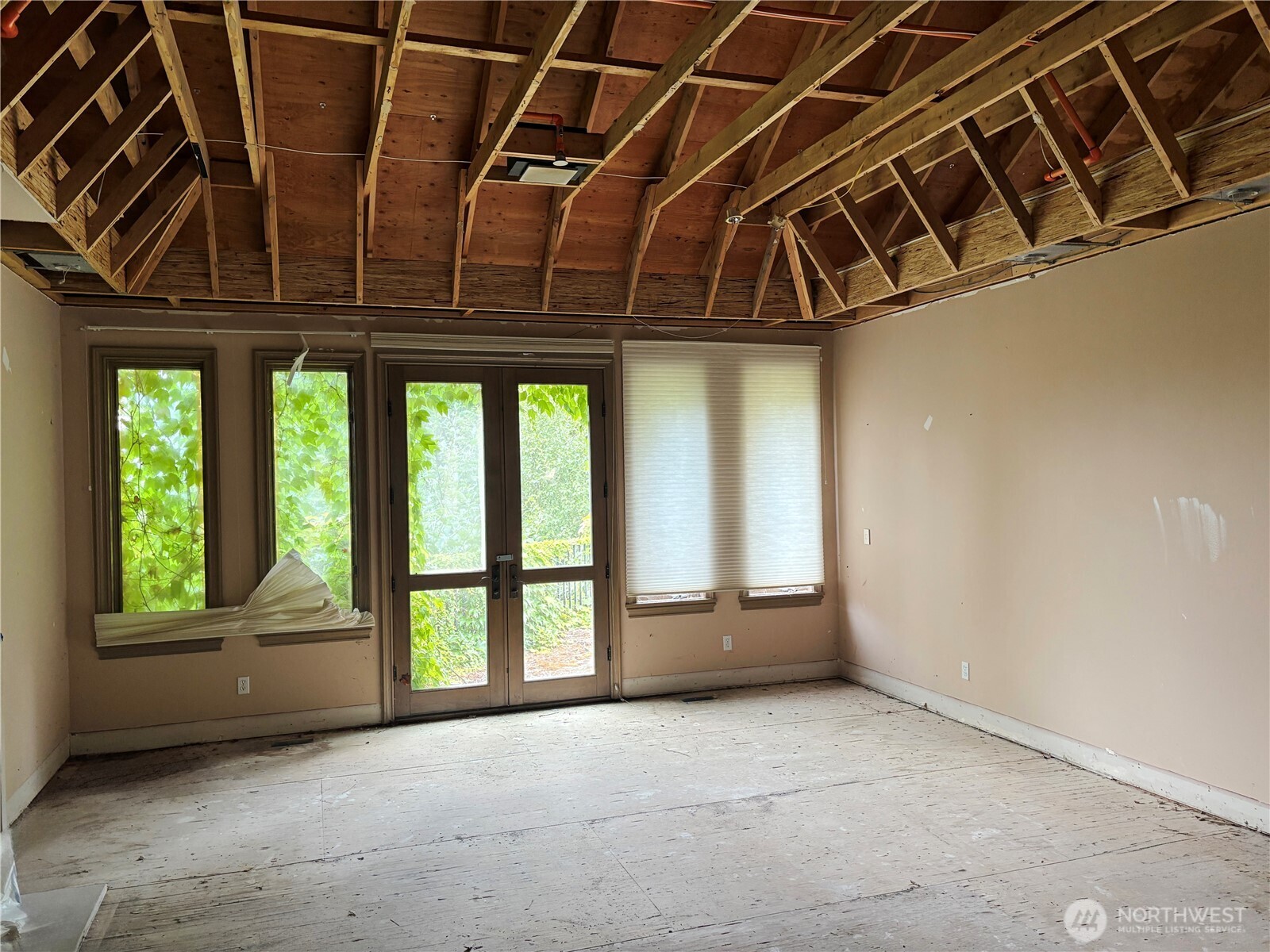 31433 Southeast 62nd Way Fall City, WA 98024 - Photo 12 of 40 a view of a room with wooden floor and windows