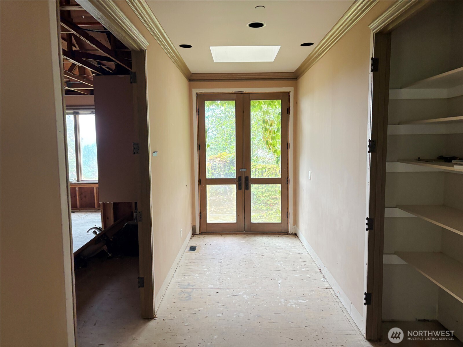 31433 Southeast 62nd Way Fall City, WA 98024 - Photo 6 of 40 a view of a room with large windows and a hallway