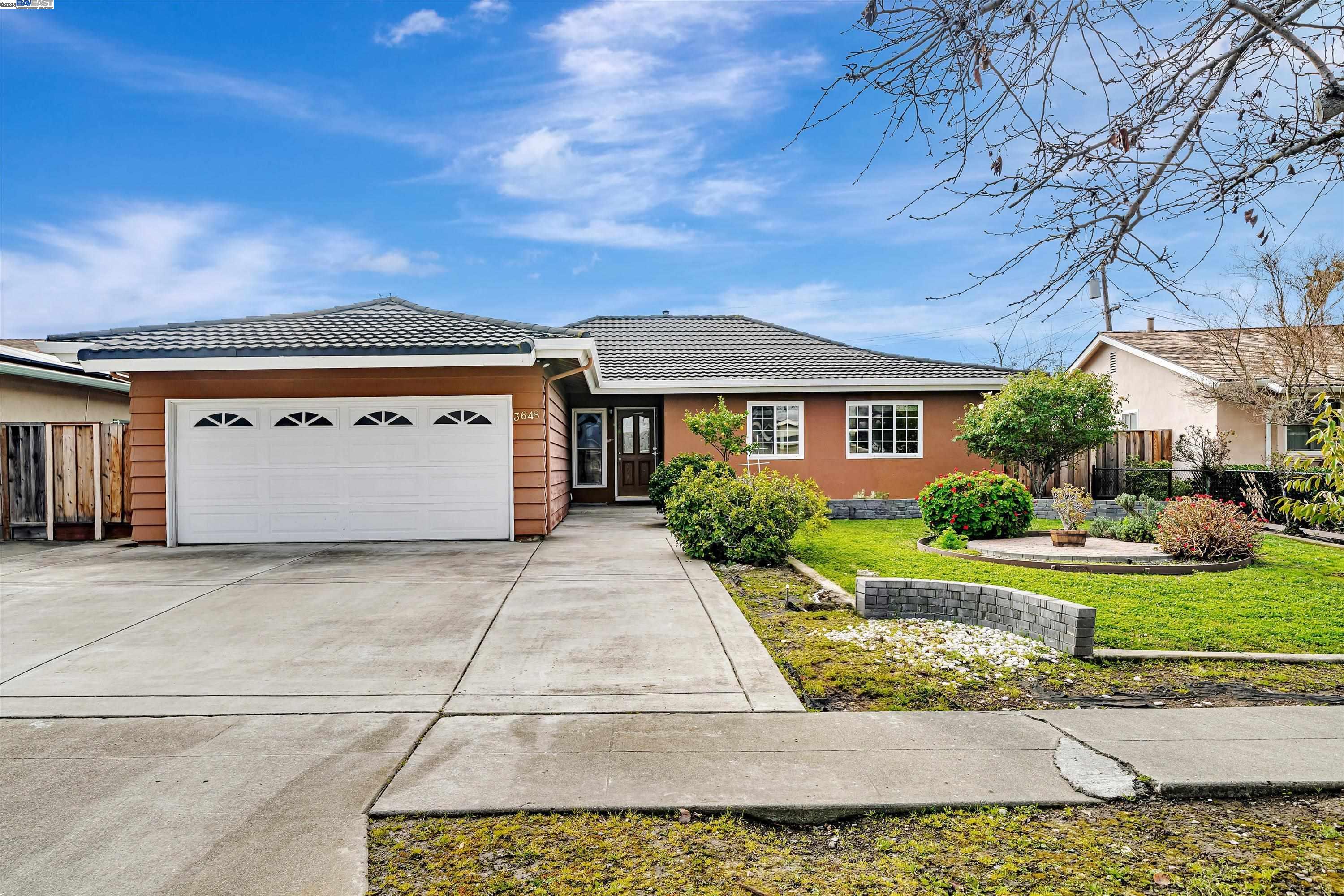 3648 Wilmington Road Fremont, CA 94538 - Photo 1 of 1 front view of a house with a yard