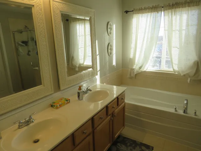 a bathroom with a sink and a bathtub