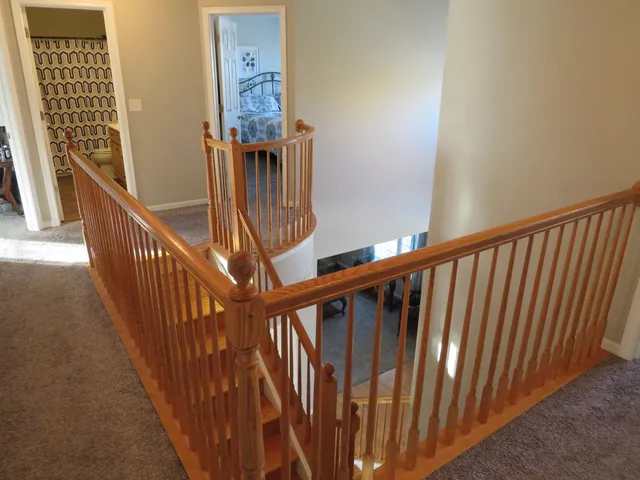 a view of entryway with wooden floor