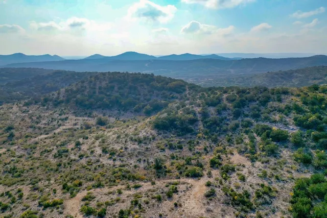 a view of a yard with an outdoor space
