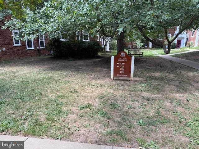 a car parked in front of a road