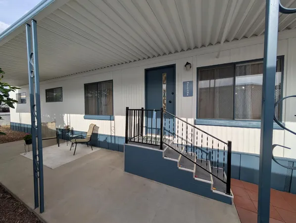 a view of a porch with chairs