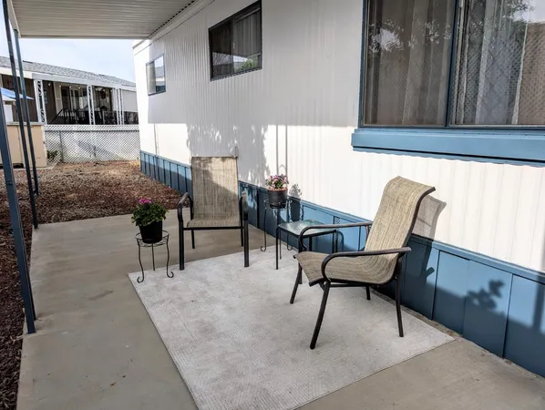 a view of a house with patio