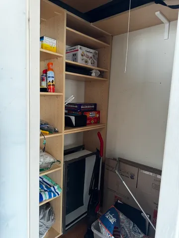 a room with storage and utility