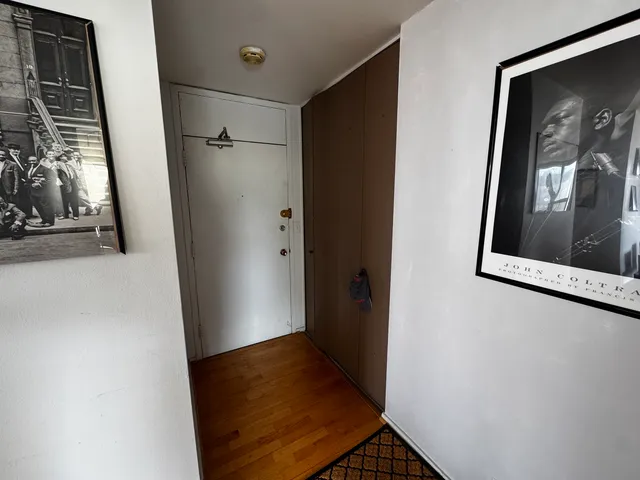 a view of elevator with wooden floor