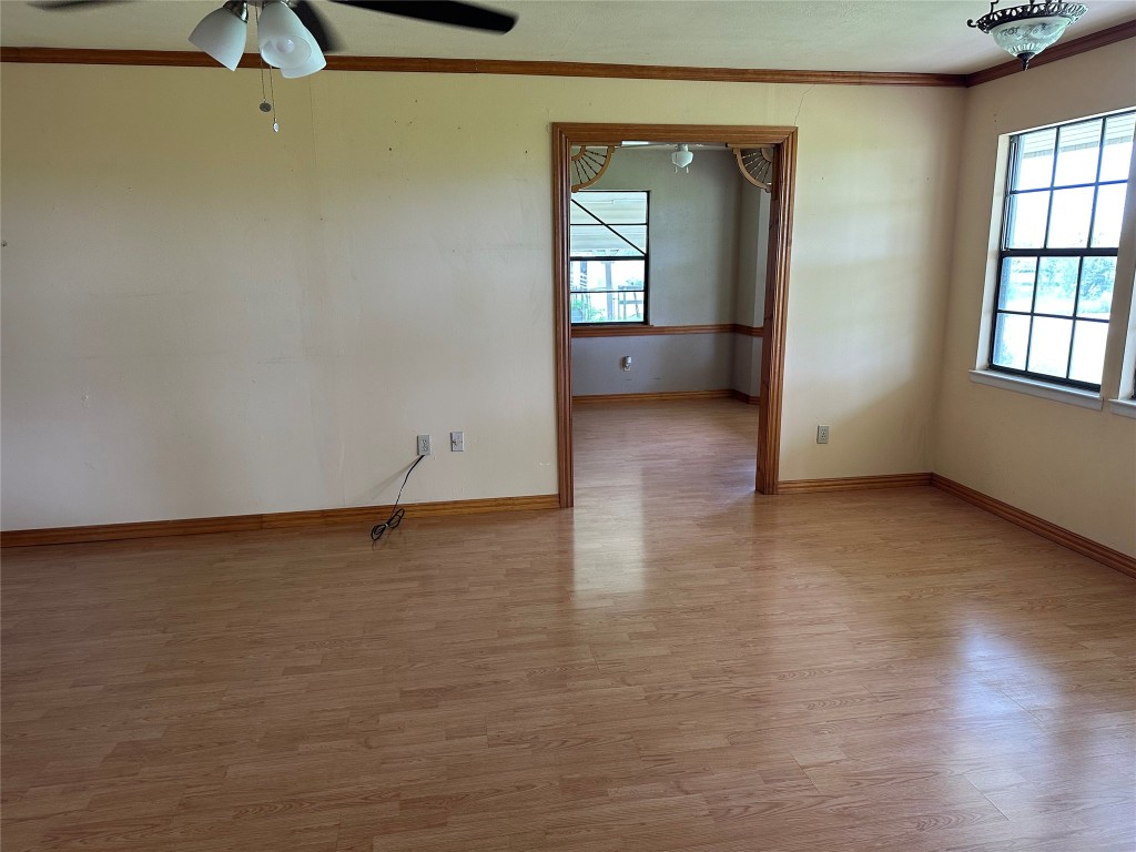 20136 Longstreet Road Richards, TX 77873 - Photo 27 of 50 wooden floor in an empty room with a window
