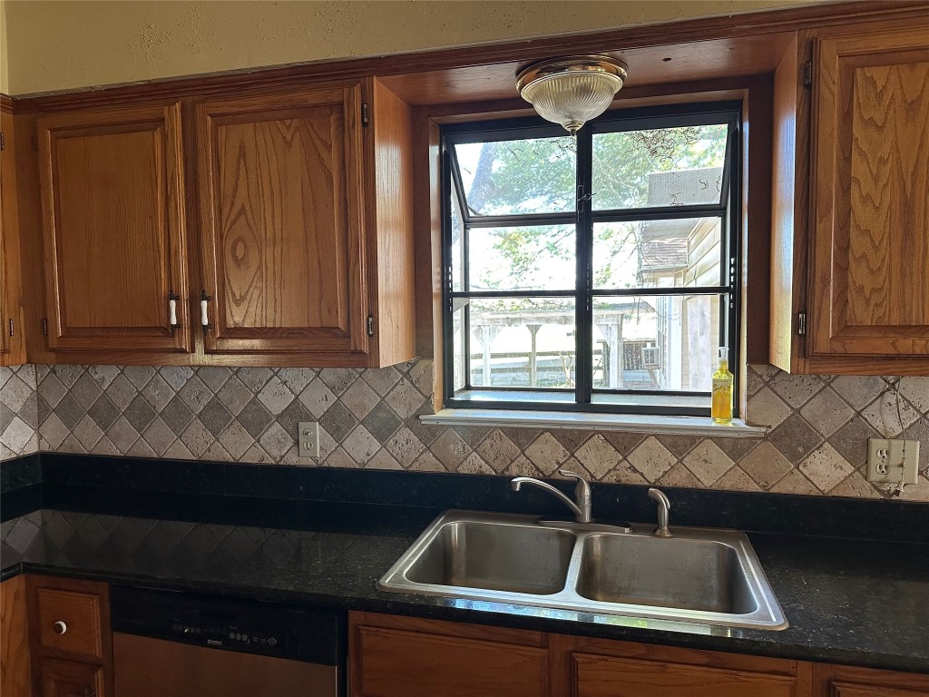 20136 Longstreet Road Richards, TX 77873 - Photo 32 of 50 a kitchen that has a sink and a window