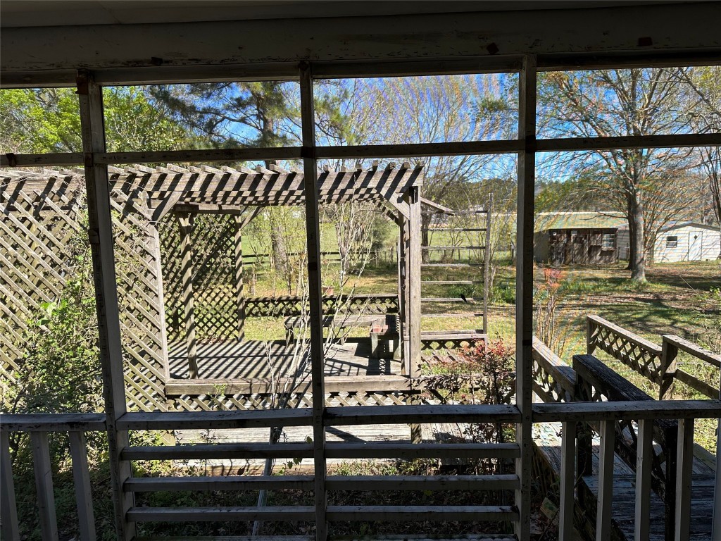 20136 Longstreet Road Richards, TX 77873 - Photo 42 of 50 a view of a balcony with wooden floor