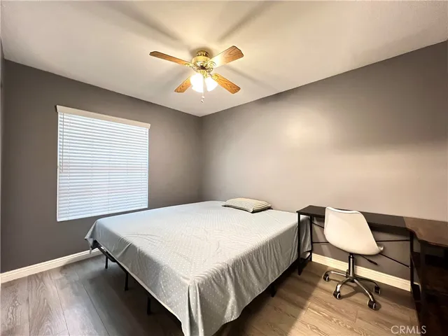 a bathroom with a double vanity sink mirror and toilet