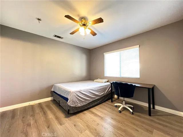 a view of a chairs and tables in the patio